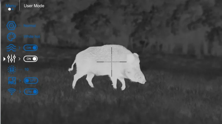 thermal riflescope displaying hog heat signatures at night.